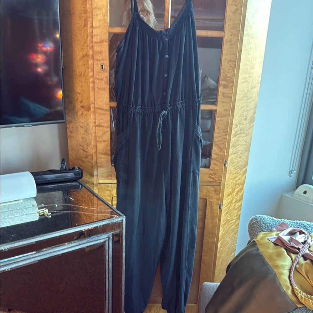Anthropologie black jumpsuit with  Cinched Waist and Spaghetti Straps